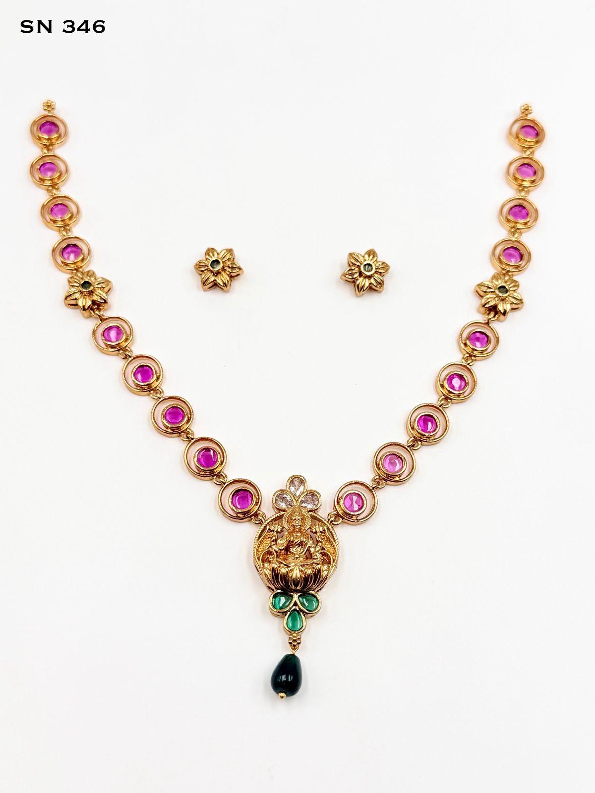 Lakshmi Devi Pendant Necklace with Floral Studs